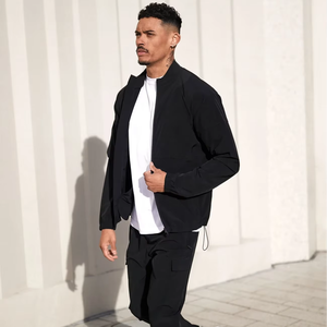 Conjunto deportivo ajustado para hombre, de algodón y poliéster, con chaqueta con cremallera y pantalones jogger, transpirable, elástico, para gimnasio y fitness. - Product Image 1