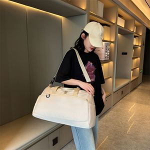 Gray Nylon Duffle Bag Rectangular Shape Zipper Closure Shoulder Strap 20-36L Capacity Water Resistant Workout Use - Product Image 4