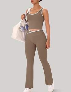 ชุดออกกำลังกายผู้หญิง 2 ชิ้น ชุดโยคะ กางเกงเลกกิ้งขาบานแบบไขว้ เสื้อครอปท็อปแต่งขอบตัดสี - Product Image 3