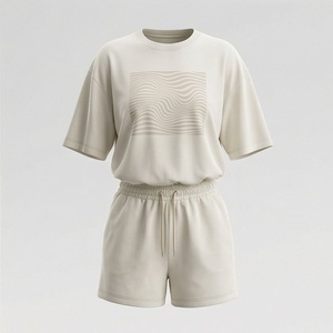 Ensemble décontracté en tricot 2 pièces pour femmes, t-shirt à manches courtes avec imprimé géométrique et short au-dessus du genou, coupe ample, vêtements de printemps et d'été - Product Image 1