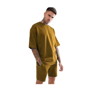Conjunto Deportivo de Algodón Verde Oliva para Hombre, Cuello Redondo, Manga Corta, Corte Holgado, Pantalones Cortos Casuales de Verano, Color Sólido, Diseño Transpirable - Product Image 1