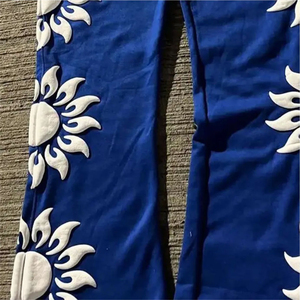 Pantalones de chándal de forro polar unisex al por mayor, estilo urbano, con gráficos personalizados, corte acampanado, holgados, para hombre - Product Image 3