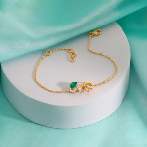 Green Leaf Swirl Diamond Bracelet with Yellow Gold Flowing Curves and Elegant Nature Inspired Center Design - Product Image 4