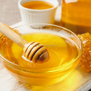 Miel de moutarde naturel doré foncé à l'arôme fort directement de l'apiculteur en Inde emballé dans un bocal en verre rond approvisionnement en vrac - Product Image 5