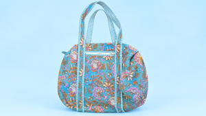 Sac de voyage matelassé durable à motif floral avec doublure en polyester, sac fourre-tout à bandoulière en coton avec fermeture éclair pour les courts séjours - Product Image 1
