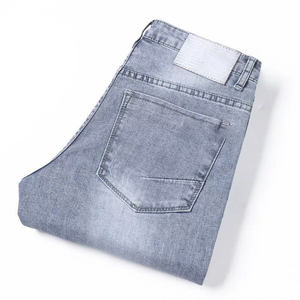 กางเกงยีนส์ผู้ชายสไตล์เกาหลี ดีไซน์โลโก้แบบ OEM  ทรงสลิมฟิต ยืดหยุ่น น้ำหนักเบา ระบายอากาศได้ดี แห้งเร็ว เหมาะสำหรับใส่ลำลองในฤดูใบไม้ร่วง - Product Image 1