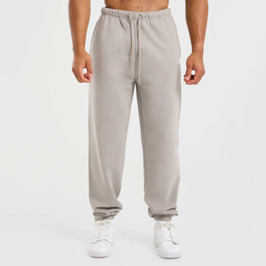 Pantalones Deportivos de Alta Calidad al Por Mayor con Logotipo Personalizado para Hombre, Corte Holgado, Secado Rápido, Transpirables, Estilo Baggy, con Puños Elásticos - Product Image 1