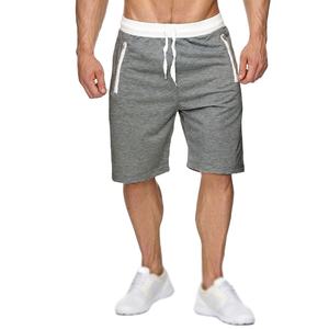 2024 été nouveaux hommes 100% Polyester haut sport course Shorts de plage couleur unie mince fermeture éclair poche ample décontracté jambe droite - Product Image 1