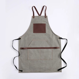 Delantal de Trabajo Unisex de Cuero Genuino con Detalles en Cuero, Correas Ajustables, Múltiples Bolsillos, Resistente al Polvo y a la Penetración de Agujas - Product Image 1