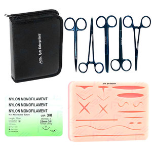 Kit de Práctica de Sutura para Estudiantes de Medicina con Almohadilla de Silicona para Suturas, Pinzas e Instrumentos Médicos Manuales, con Heridas Precortadas - Product Image 1