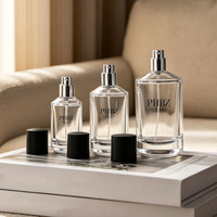 Flacon de parfum rond en verre transparent à épaule inclinée 30ml 50ml 100ml avec pompe pulvérisatrice argentée, atomiseur vide rechargeable personnalisé