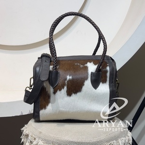 Bolsos cruzados de cuero genuino de vaca al por mayor, duraderos, de alta calidad, con cierre de cremallera, bolsos de viaje tipo lona para pasar la noche, estilo Speedy - Product Image 1