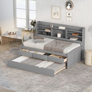 Cama individual de madera color gris claro con estanterías integradas y tres cajones de almacenamiento, incluye cama nido. - Product Image 1