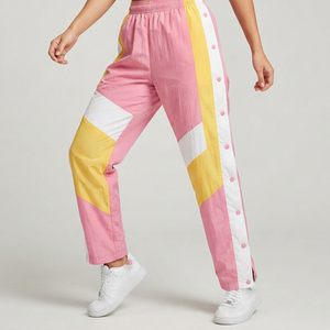 Pantalones Cortavientos Elásticos Premium con Botones Laterales para Niñas - Product Image 1