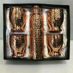 Handcrafted Hammered <b>Copper</b> <b>Bottle</b> Set with 4 Matching Glasses Durable Metallic Drinkware for Wellness and Hospitality Gifts - Product Image 1