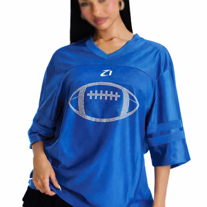 เสื้อเจอร์ซีย์อเมริกันฟุตบอลผู้หญิงสีน้ำเงินคุณภาพพรีเมียม ตกแต่งด้วยกราฟิกคริสตัล ผ้าโพลีเอสเตอร์ทรงโอเวอร์ไซส์ เสื้อยืดกีฬาแฟนเวียร์แบบสั่งทำพิเศษ - Product Image 1