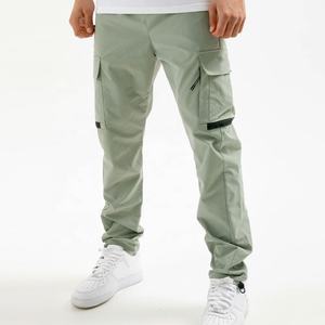 Pantalon cargo fuselé réglable pour hommes avec caractéristiques personnalisées Tissu extensible durable Marque personnalisée Multi-poches - Product Image 1