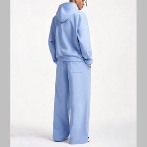 Conjunto de chándal de invierno personalizado de punto gofrado 100% algodón para mujer, con sudadera con capucha y cremallera, y pantalones acampanados de pierna ancha, dos piezas. - Product Image 3