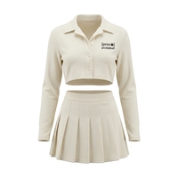 Ensemble de survêtement et jupe-short de pickleball pour femme à manches longues, en tissu côtelé léger, avec boutons sur le devant, col rond, séchage rapide, couleur unie