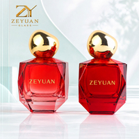 Flacon de parfum en verre rouge taillé en forme de bijou de 100 ml avec atomiseur de parfum vide géométrique et capuchon rond doré [Couleur + Logo disponibles]