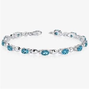 Pulsera de tenis elegante y minimalista de plata de ley chapada en oro con topacio azul de Londres, corte ovalado, 5.5 quilates, certificada, para aniversario - Product Image 1