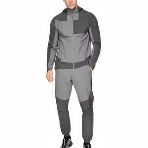 Ensemble de survêtement à capuche pour homme, gris, avec blocs de couleur, manches longues, fermeture éclair et poches latérales, idéal pour l'automne, vente en gros - Product Image 1