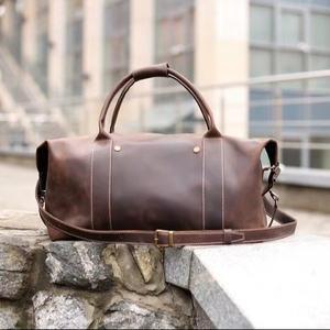 กระเป๋าหนังแท้แบบดัฟเฟิล กระเป๋าเดินทางวินเทจสำหรับวันหยุดสุดสัปดาห์  ขนาดใหญ่ น้ำหนักเบา ซิปปิด  สำหรับทุกเพศ  ขายตรงจากโรงงาน - Product Image 1