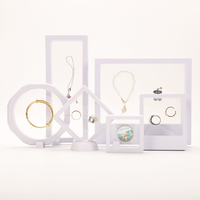 Boîte rigide transparente anti-oxydation haut de gamme avec support flottant 3D pour boucles d'oreilles et bijoux, doublée d'éponge