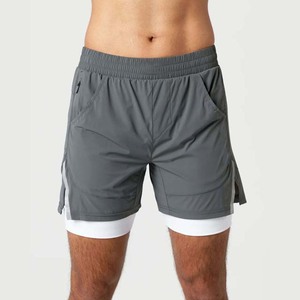 Shorts de sport gris uni pour homme, à séchage rapide, taille élastique, avec poches, taille mi-haute, en polyester tissé - Product Image 1