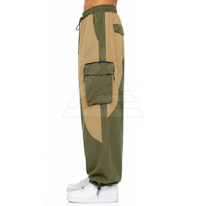 Pantalones de Paracaídas para Hombre con Corte Holgado, Puños Ajustables, Tela Ligera y Bolsillos Laterales para Moda Urbana - Product Image 6