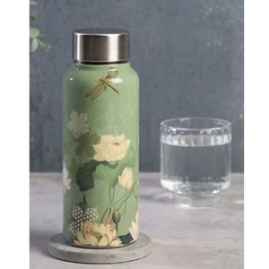 Nouvelle arrivée : Bouteille en cuivre imprimée avec autocollant émaillé, pour la cuisine, le stockage de l'eau et les bienfaits ayurvédiques pour la santé. - Product Image 4