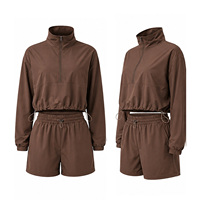 Survêtement léger en nylon respirant à capuche imprimé pour femme, idéal pour l'entraînement de performance, personnalisable OEM, style streetwear et vêtements de sport