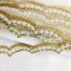 Tissu en dentelle perlée écologique de luxe avec broderie française et motif géométrique pour robes de mariée et tenues de soirée - Product Image 1