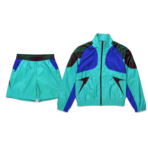 Ensemble de sport 2 pièces color block pour femme : veste de survêtement à capuche à manches longues en polyester respirant et imperméable et short longueur genou - Product Image 1