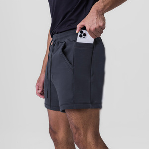 Shorts de basket-ball en coton pour hommes OEM, shorts de sport et de course avec poches latérales, design uni, shorts pour hommes - Product Image 1