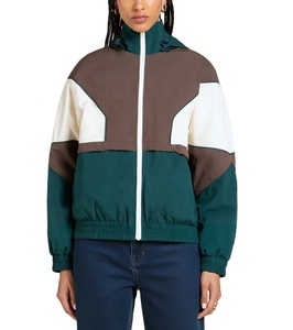 Chaqueta cortavientos informal de la mejor calidad para exteriores, con logotipo personalizado, bloques de color, cremallera y capucha, para mujer. - Product Image 1