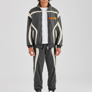 Ensemble de survêtement sportif unisexe avec fermeture éclair intégrale, design color block, matière polyester respirante, logo imprimé sur le devant, pour adulte - Product Image 1