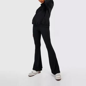 Ensemble de survêtement d'hiver pour femme, style streetwear personnalisé, avec haut court et pantalon évasé, motif uni, 100% coton - Product Image 1