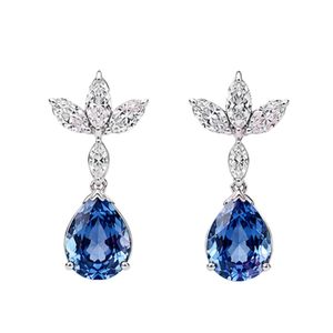 Exquisitos pendientes de joyería fina en oro blanco de 18 quilates con piedras centrales azules reales de corte pera, adornados con marquesa y ovalados. - Product Image 1