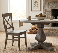 Meubles et décoration de maison indonésiens Table ronde en bois de teck recyclé avec pied croisé unique
