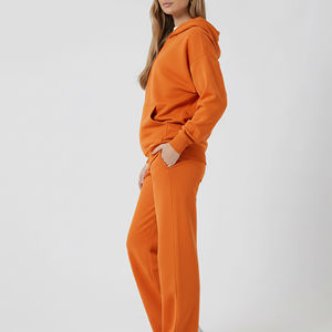 <b>Women</b> Orange Hooded Tracksuit Set Full Length Loose Fit Gymwear Sweatshirt and <b>Sweatpants</b> With Side Pockets Custom Logo Printed - Product Image 2