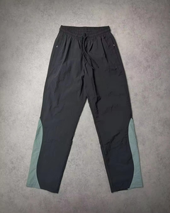 Ensemble survêtement coupe-vent oversize pour homme, 2 pièces : veste zippée et pantalon évasé, 100% nylon, bandes réfléchissantes, nouveau design. - Product Image 4