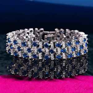 Bracelet tennis vintage en saphir bleu plaqué or, conçu pour une élégance royale, éclat bleu profond, bijoux de luxe intemporels - Product Image 1