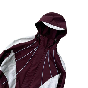 เสื้อแจ็คเก็ตกันลมแบบมีฮู้ดน้ำหนักเบาบางเบาสำหรับฤดูหนาว ตกแต่งด้วยผ้าแบบแพทช์เวิร์ค พร้อมกางเกงวอร์มเอวยางยืดมีซิป ดีไซน์ทันสมัยสำหรับการออกกำลังกายและสวมใส่สบายๆ - Product Image 6