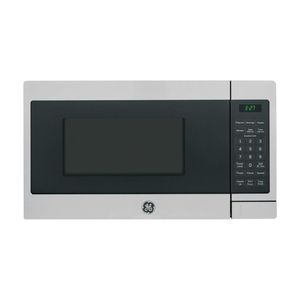 Four à micro-ondes 700 Watts, option de dégivrage automatique ou manuel, essentiels de cuisine pour le comptoir, capacité de 0,7 pied cube - Product Image 1