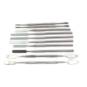 Juego de 5 espátulas dentales manuales de acero inoxidable de doble cara con agarres ergonómicos para los dedos de Grip Surgical - Product Image 1