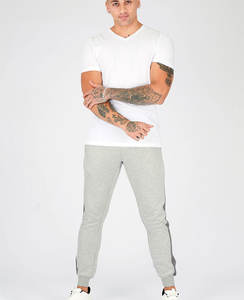 Conjunto de entrenamiento de pantalones de chándal de alta calidad personalizado unisex con tiras laterales para hombres y mujeres venta al por mayor chándal personalizado chándal - Product Image 1