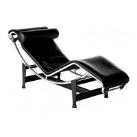 Chaise longue moderne en cuir noir avec appui-tête et structure métallique pour la maison, le bureau, le hall d'hôtel, le salon, la zone VIP