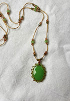Collier artisanal en macramé avec onyx vert, pendentif ovale en pierre facettée, cordon réglable, chaîne perlée, bijoux artisanaux, cadeau