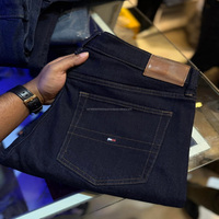 Pantalon en jean droit pour homme en coton et élasthanne, confortable, décontracté, brodé, délavé au laser, coupe bootcut évasée, fournisseur direct d'usine en gros